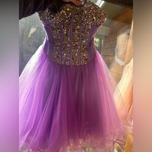 Purple prom dress in great (new) condition worn once.